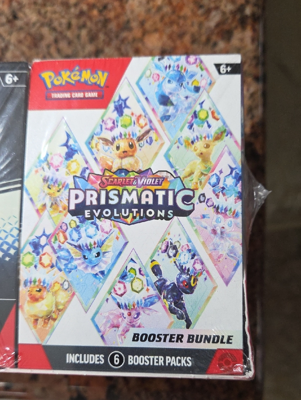Pokemon TCG Scarlet & Violet Prismatic Evolutions Surprise Box - Picture 3 of 4